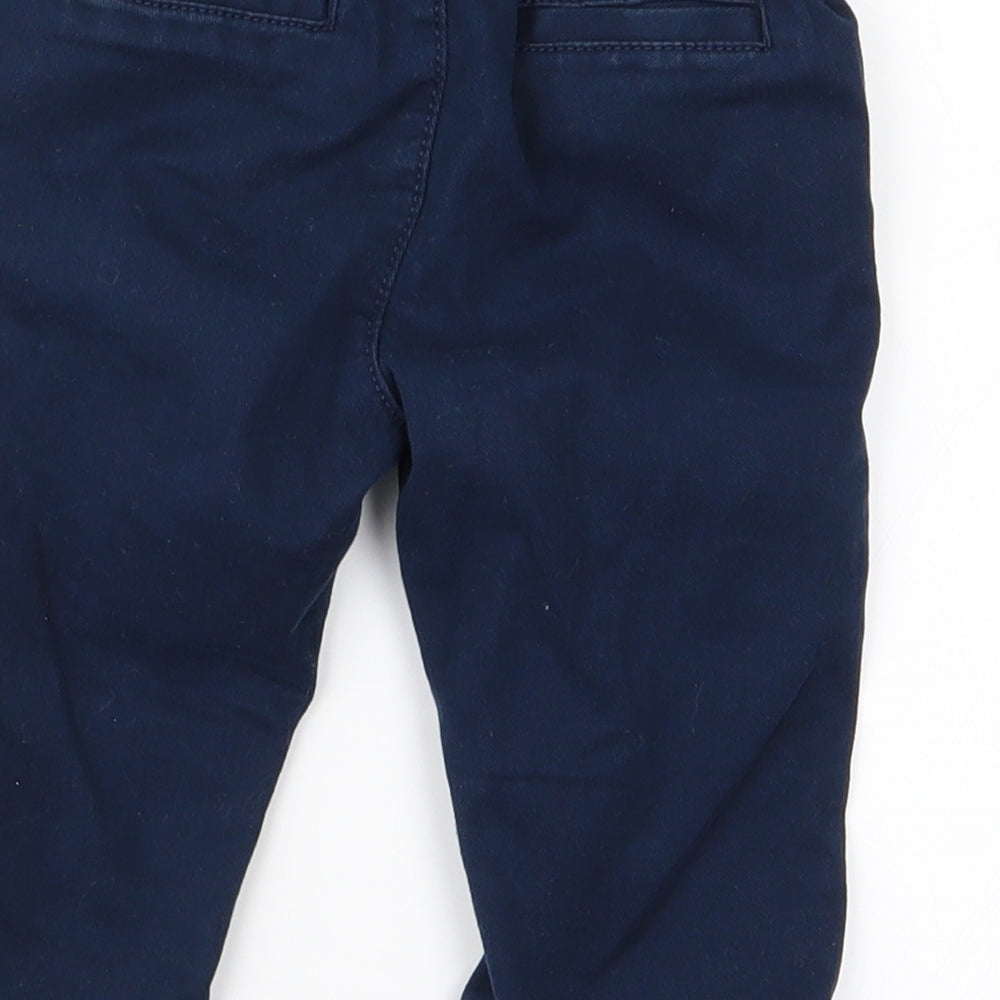 Brand and care label for Marks & Spencer Baby Blue Cargo Trousers, size 12, Months