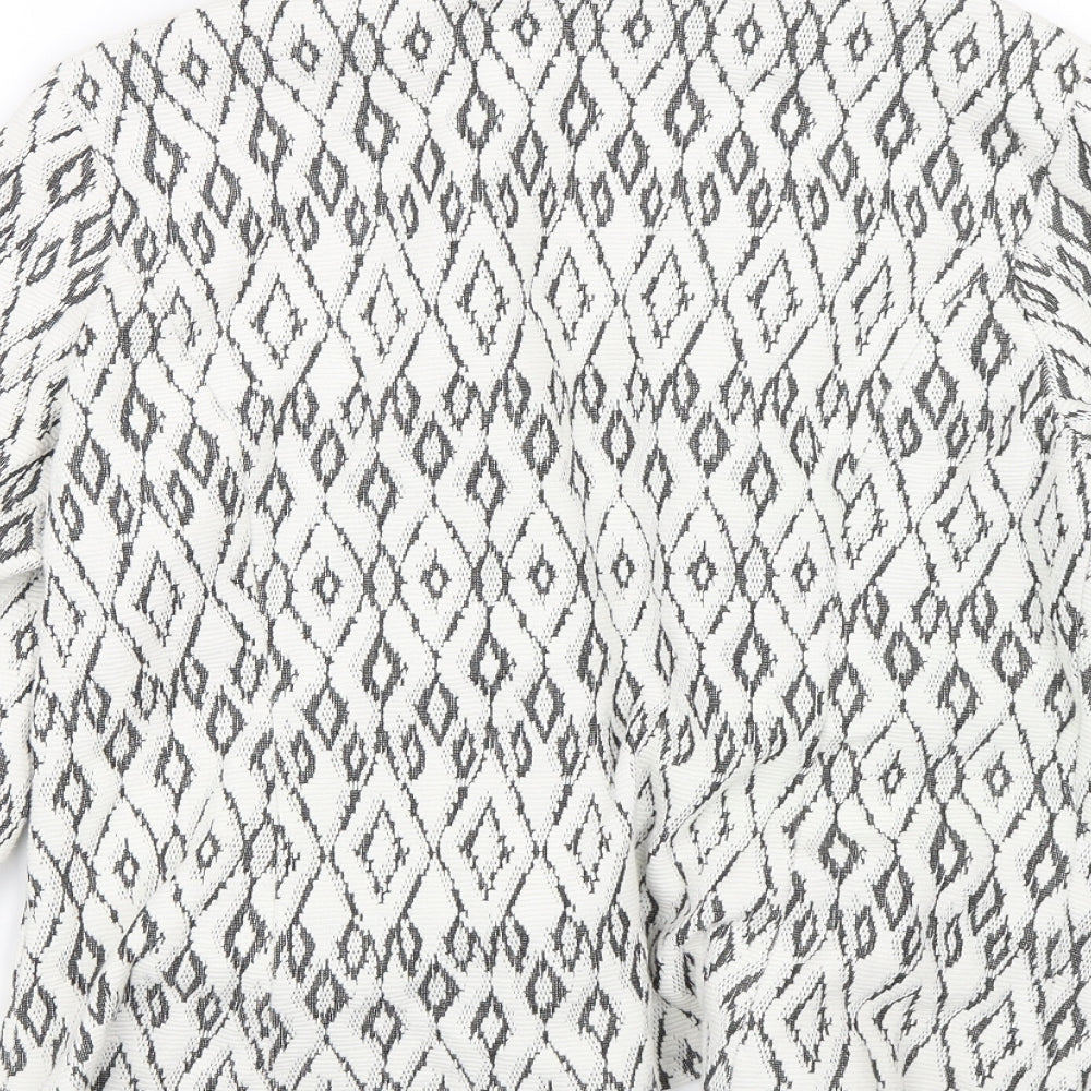 Brand and care label for Soon women’s white argyle/diamond jacket, size UK 14