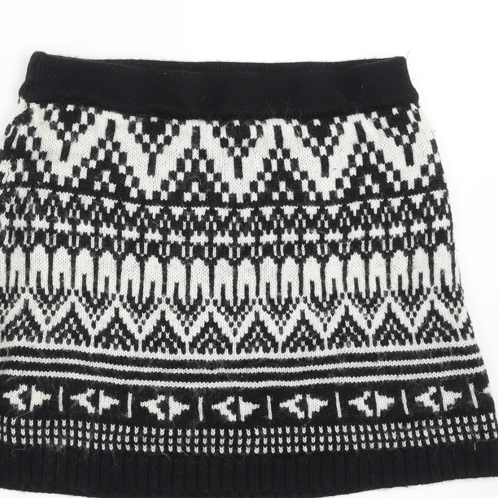 Brand and care label for Miss Selfridge women’s black geometric knit a-line skirt, size UK 8