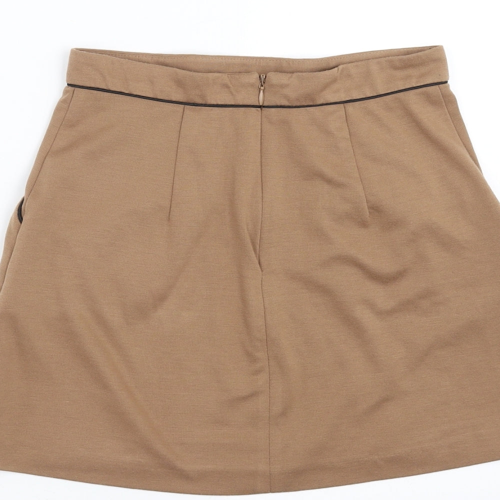 Brand and care label for Miss Selfridge women’s beige a-line skirt, size UK 8