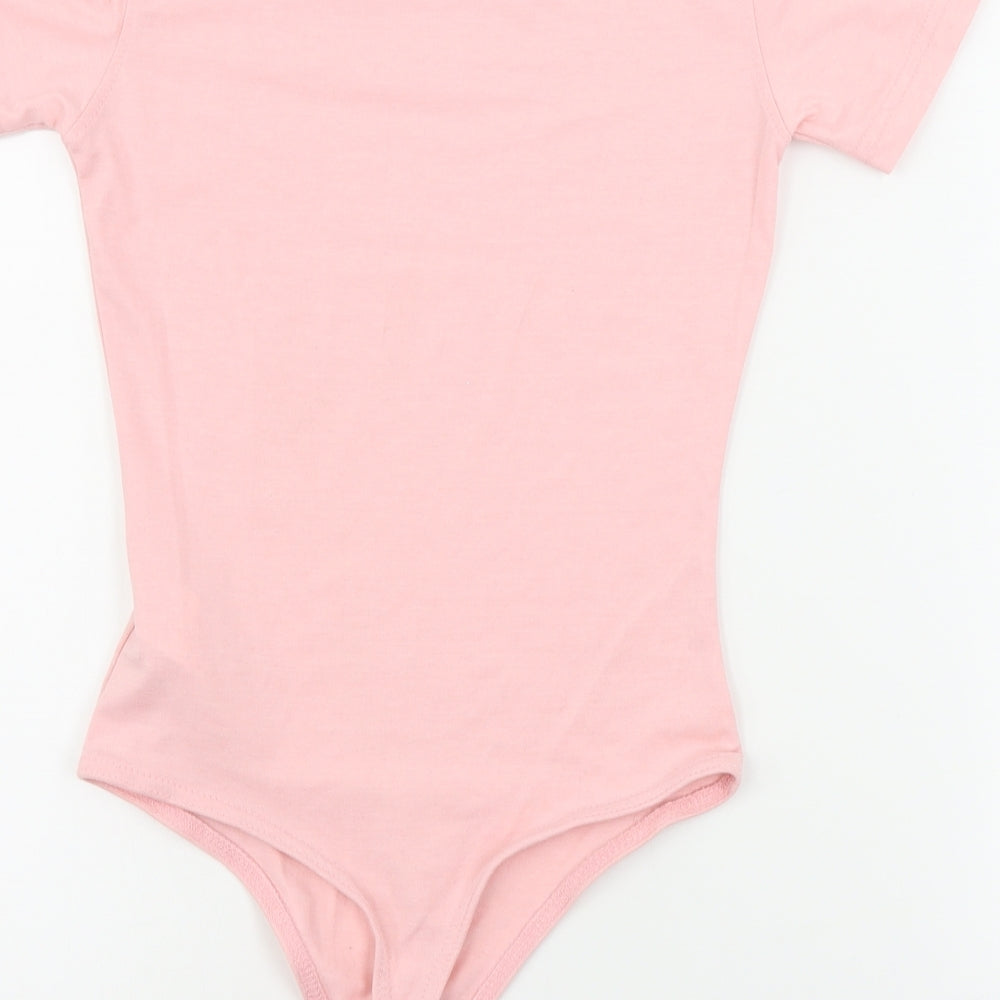 Brand and care label for Missguided women’s pink bodysuit one-piece, size UK 4