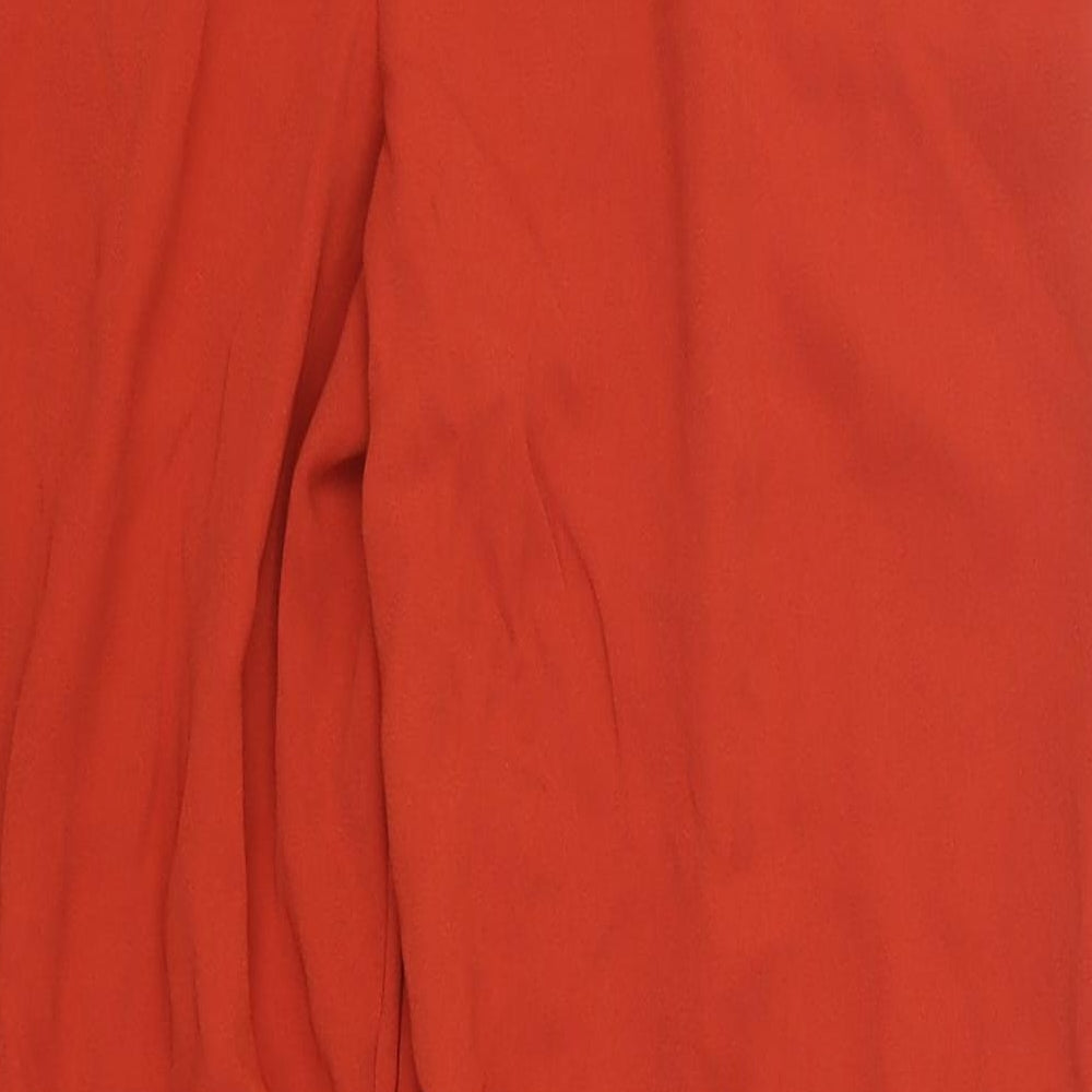 Brand and care label for Atmosphere women’s red trousers, size UK 14, 27-inch leg