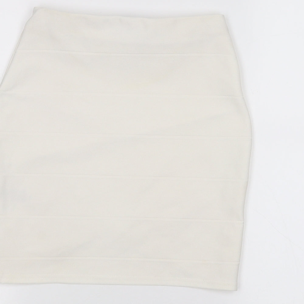 Brand and care label for Missguided women’s white a-line skirt, size UK 6