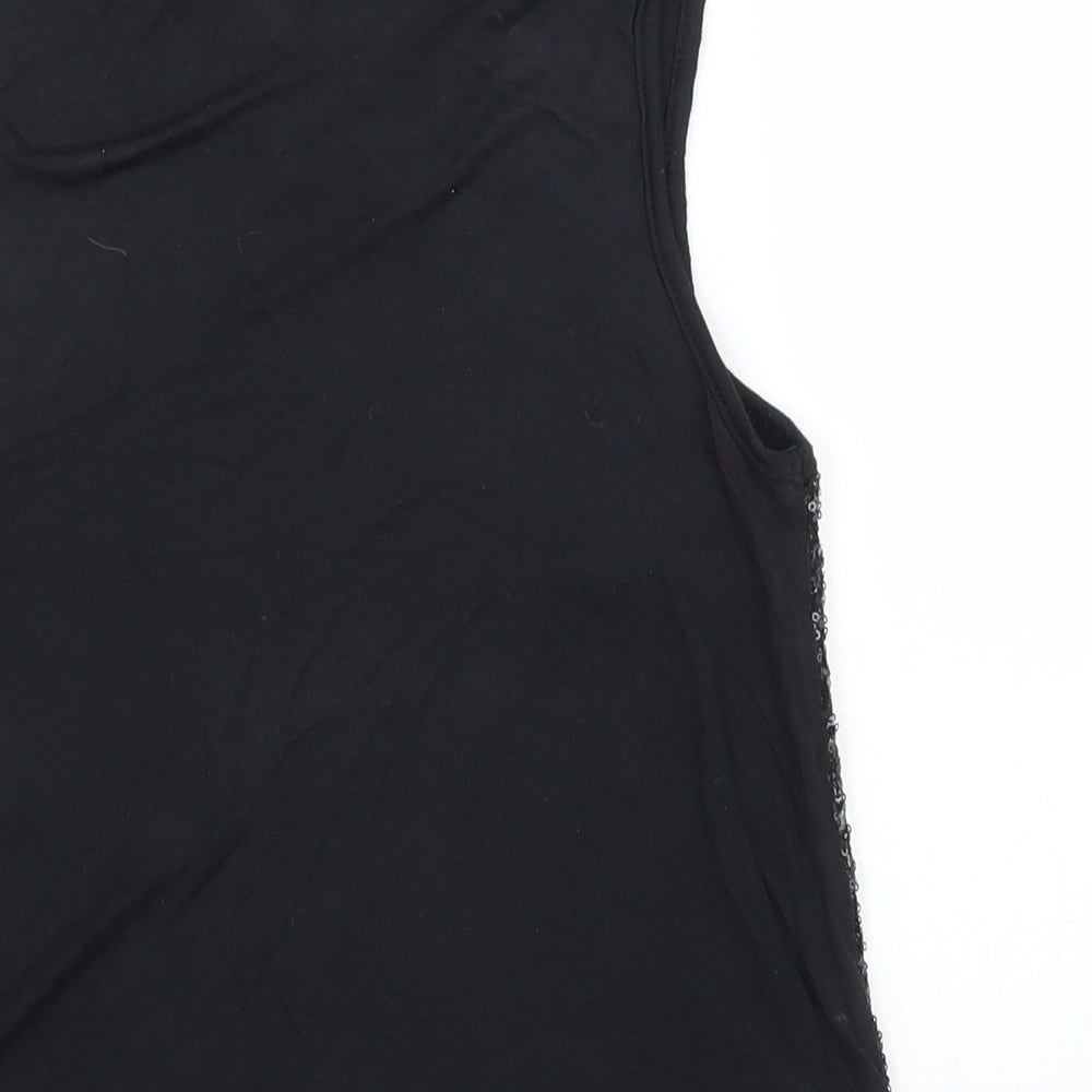 Brand and care label for Young Dimension girls’ black basic blouse, size 11, years
