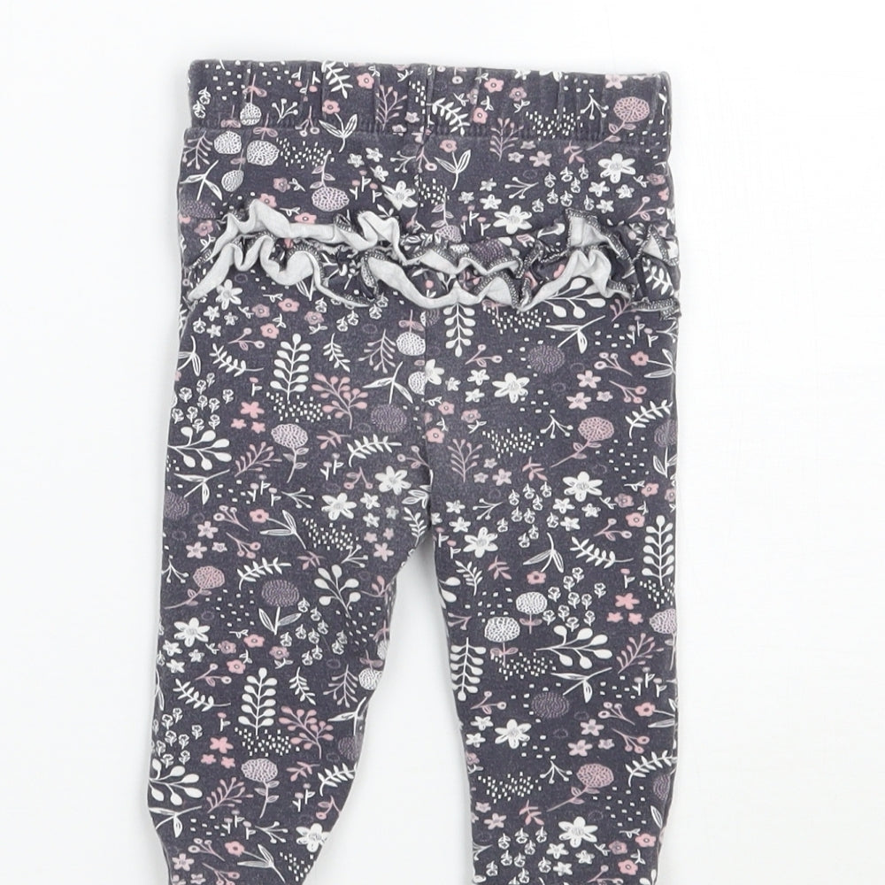 Brand and care label for George girls’ grey floral capri leggings, size 3-6, months