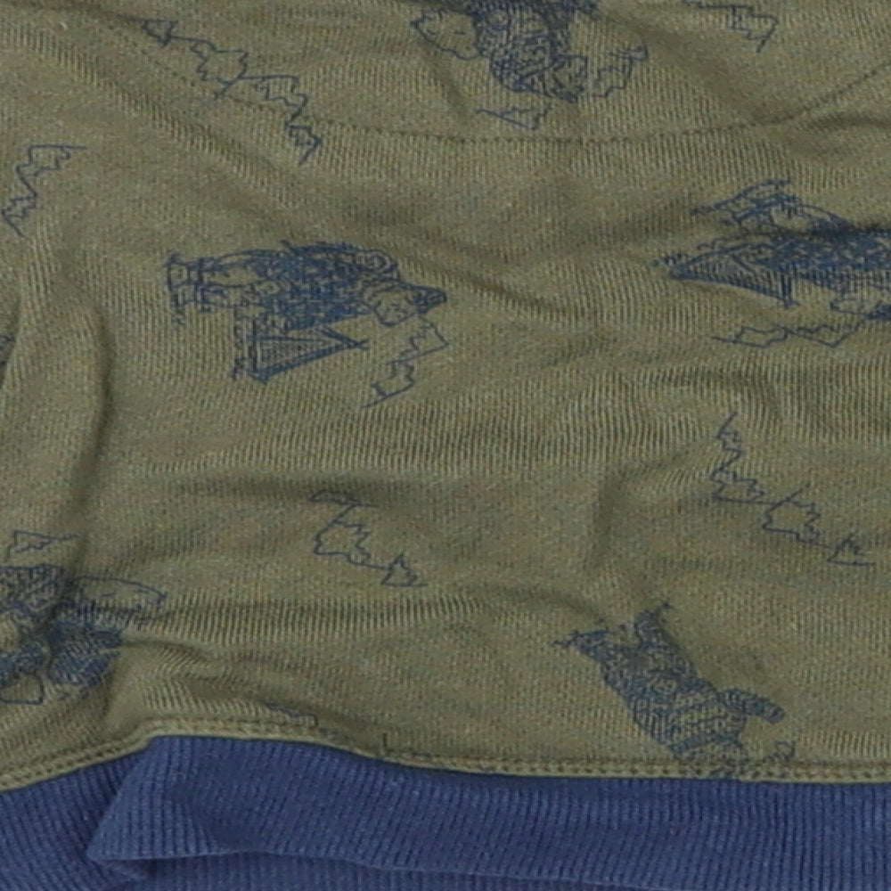 Brand and care label for La Compagnie des Petits Baby Green jumper, size 6-9, Months