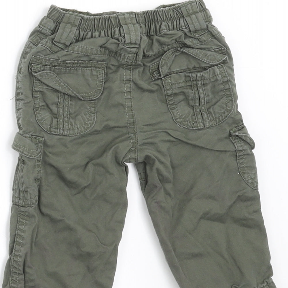 Brand and care label for George boys’ green cargo trousers, size 3-6, months - side pockets