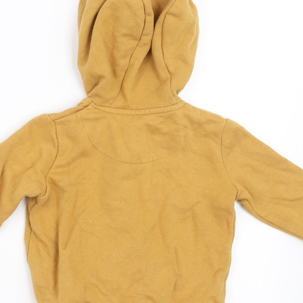 Brand and care label for F&F boys’ yellow full zip jumper, size 6-9, months - dinasour
