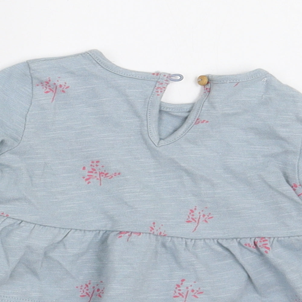 Brand and care label for Zara girls’ blue floral a-line, size 0-3, months
