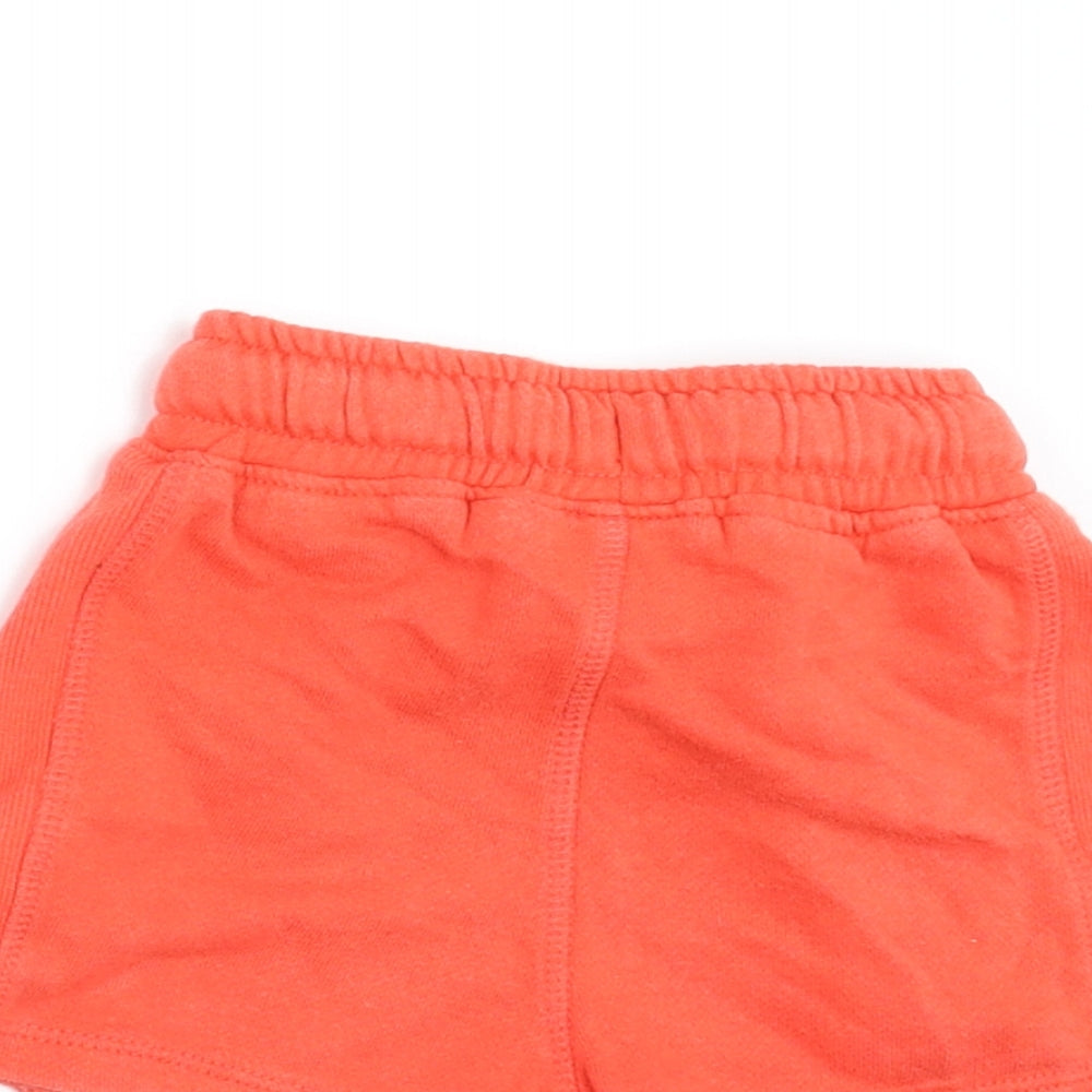 Brand and care label for Next boys’ orange jogger trousers, size 9-12, months - shorts