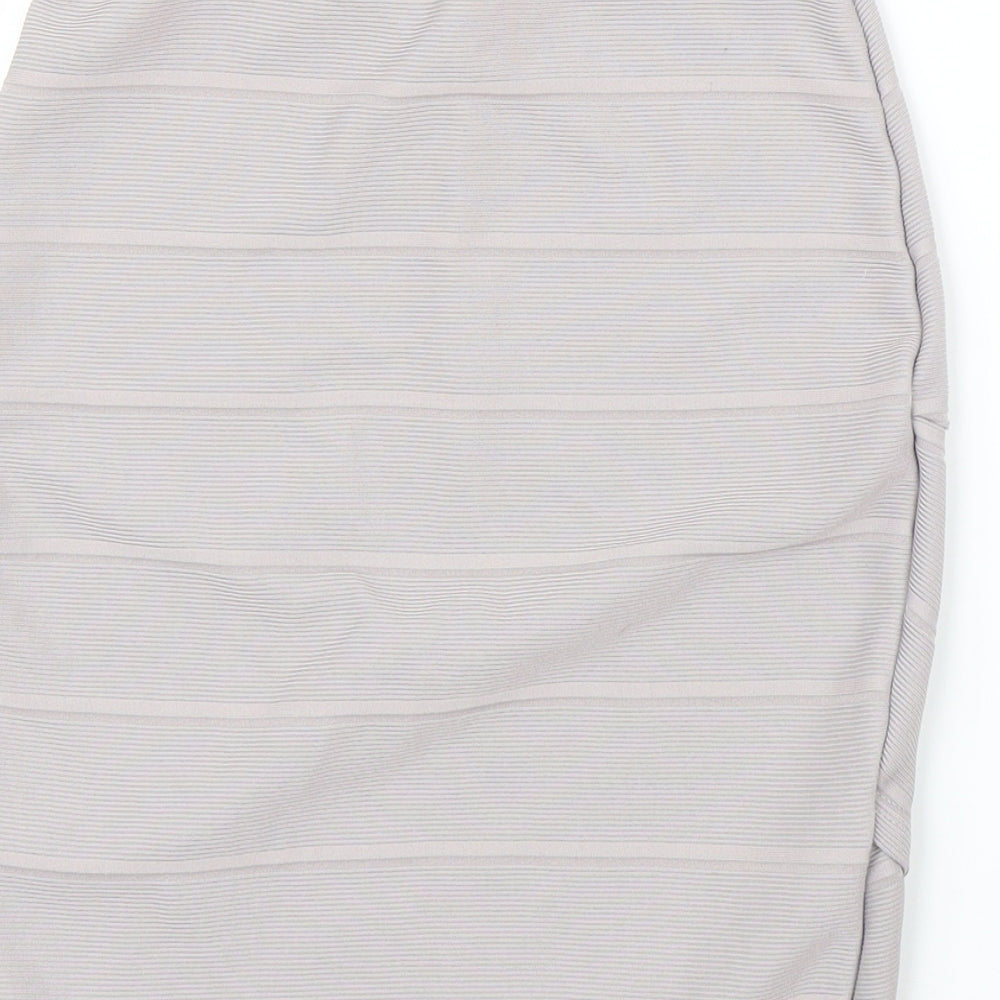 Brand and care label for Miss Selfridge women’s purple tulip skirt, size UK 8