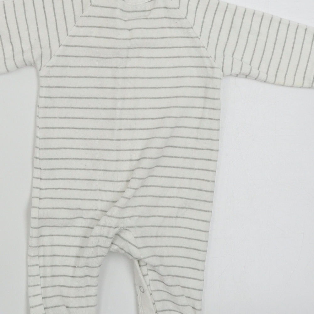 Brand and care label for Early Days boys’ white striped babygrow one-piece, size 0-3, months
