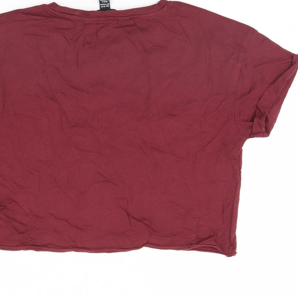 Brand and care label for New Look girls’ purple cropped t-shirt, size 12, years - kinda care kinda dont