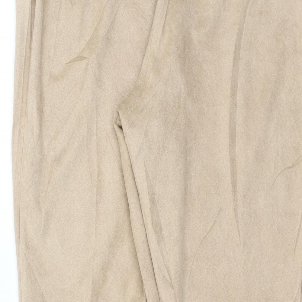 Brand and care label for Missguided women’s beige trousers, size UK 14, 27-inch leg