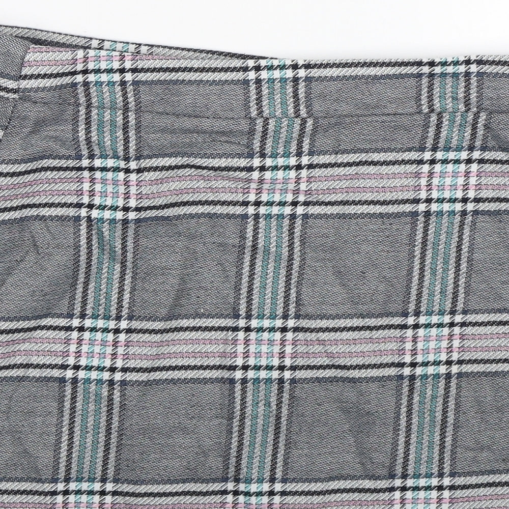 Brand and care label for ASOS women’s grey plaid mini skirt, size UK 12