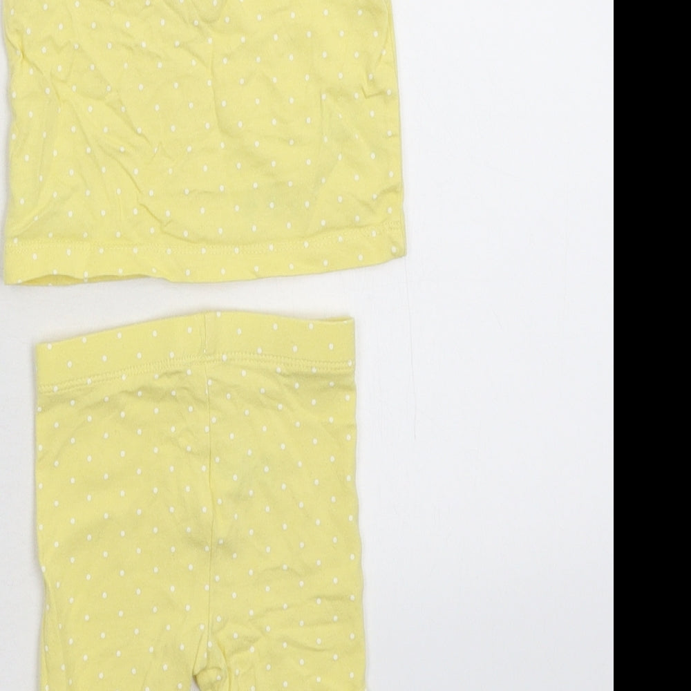 Brand and care label for Mini Club girls’ yellow spotted babydoll pyjama set, size 0-3, months