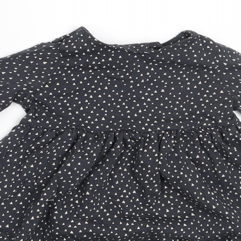 Brand and care label for Next girls’ grey geometric a-line, size 0-3, months