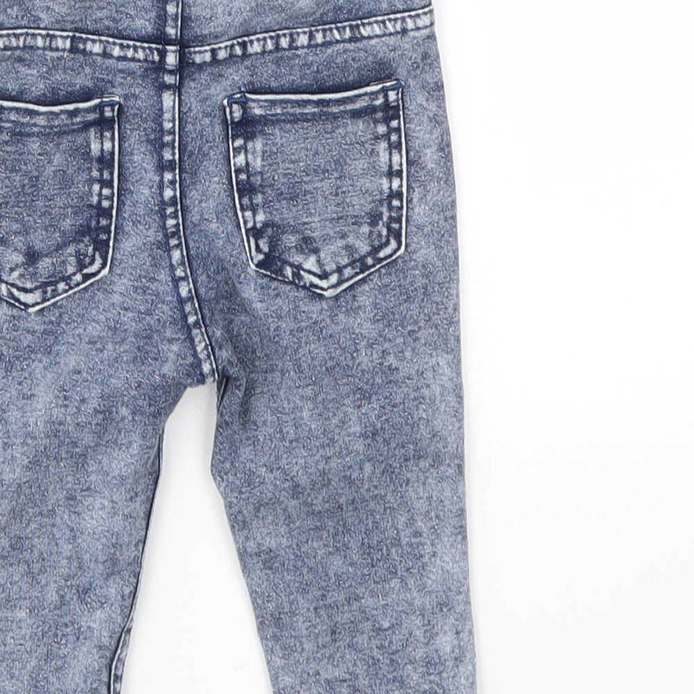 Brand and care label for H&M girls’ blue capri jeans, size 3-6, months