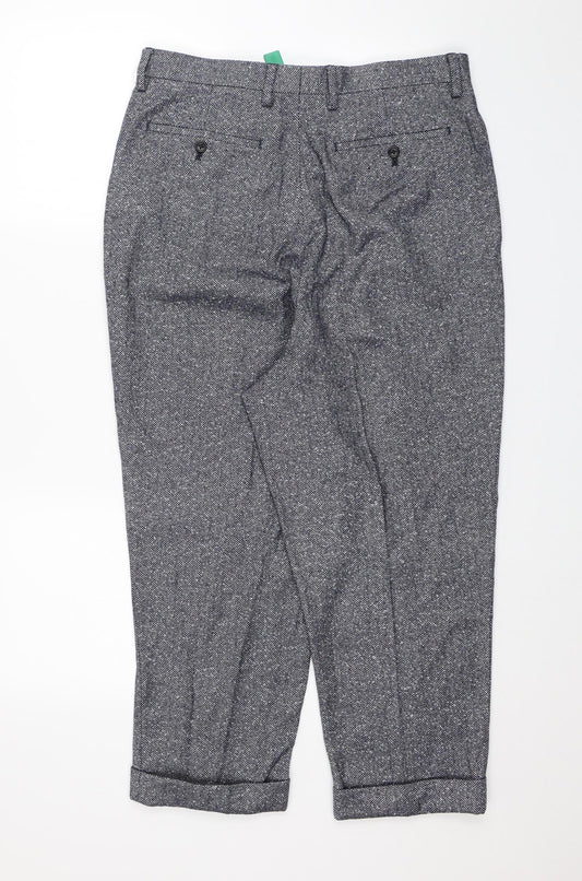 Back view of ASOS men’s blue trousers, size 32, in, 22-inch leg