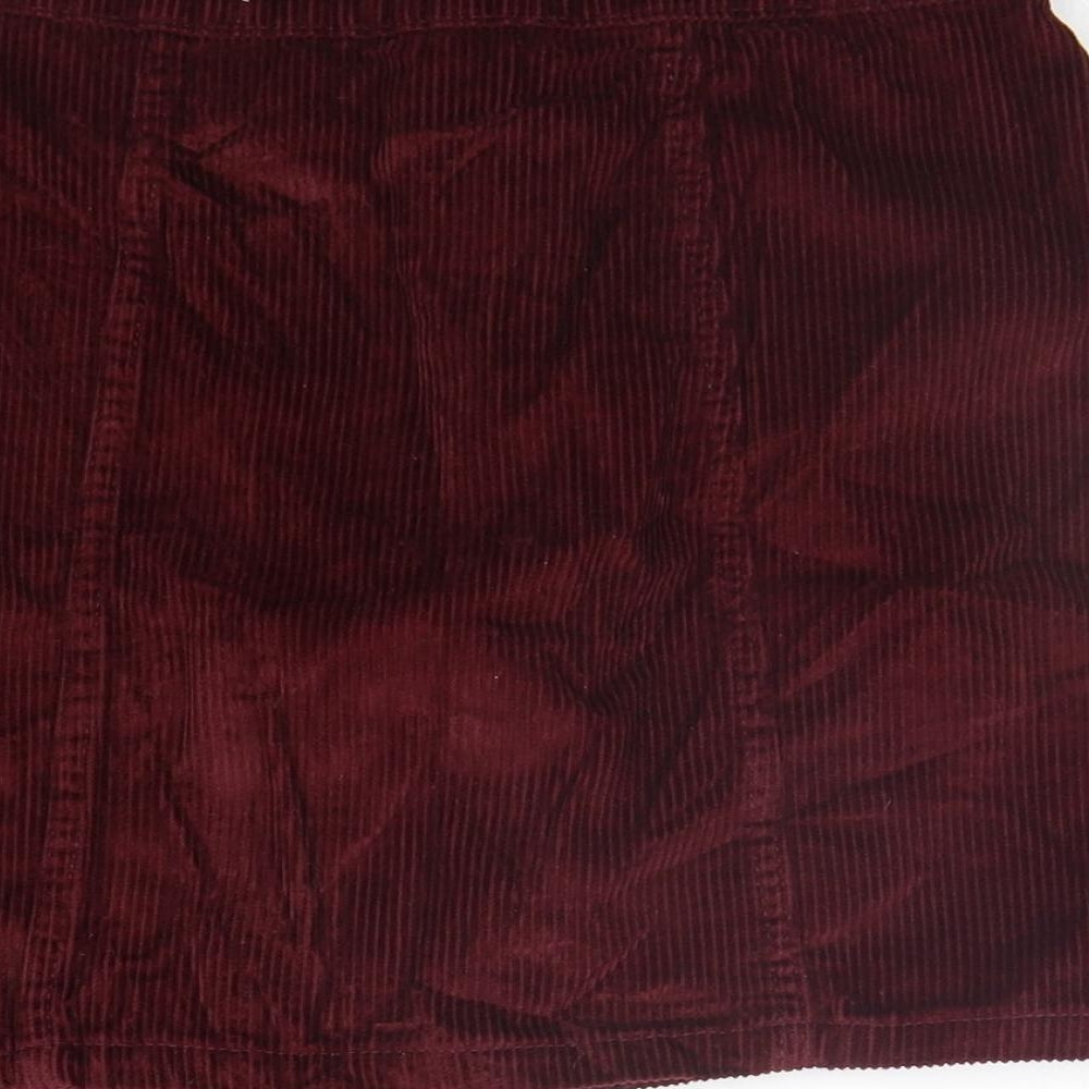 Brand and care label for Denim & Co. women’s purple a-line skirt, size UK 8