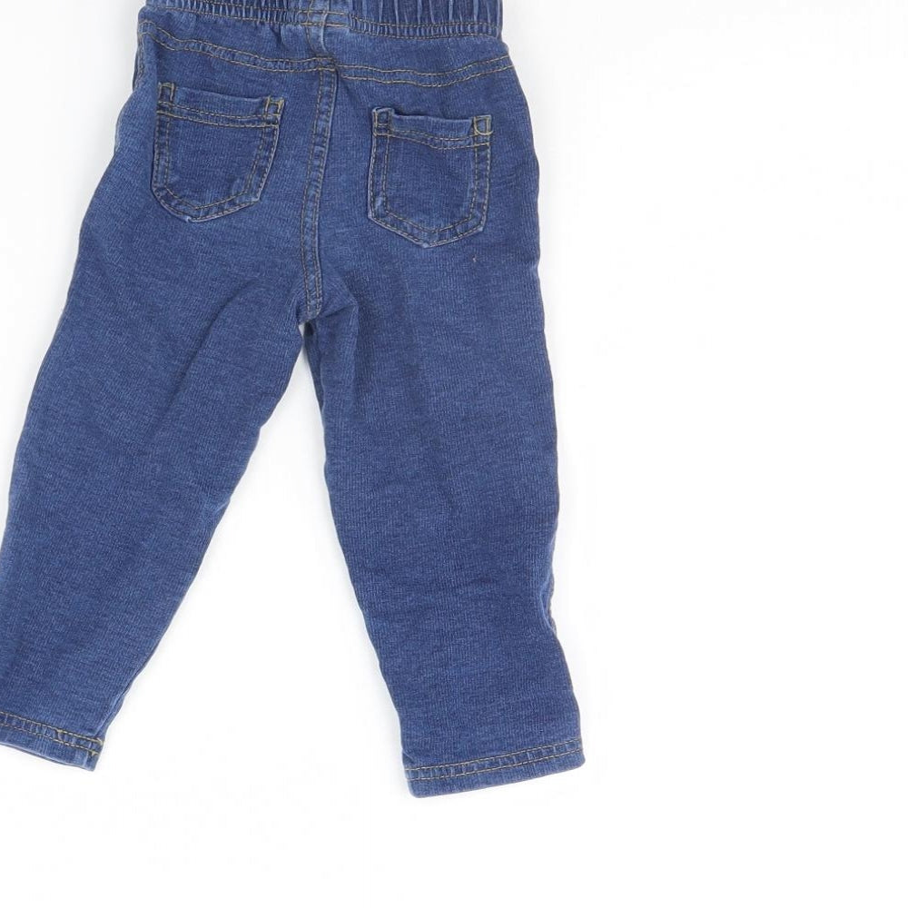 Brand and care label for Mini Club girls’ blue denim capri jeans, size 9, months