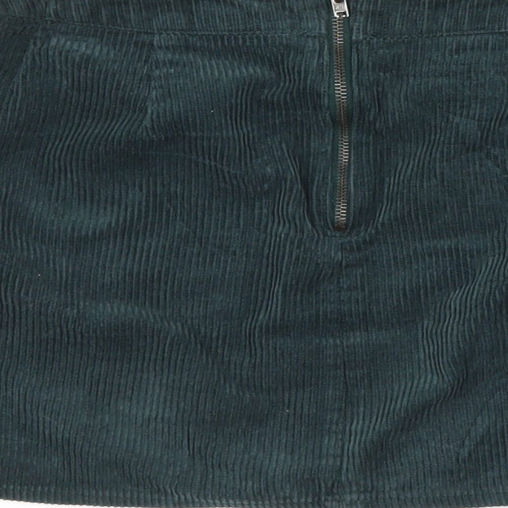 Brand and care label for BDG women’s green a-line skirt