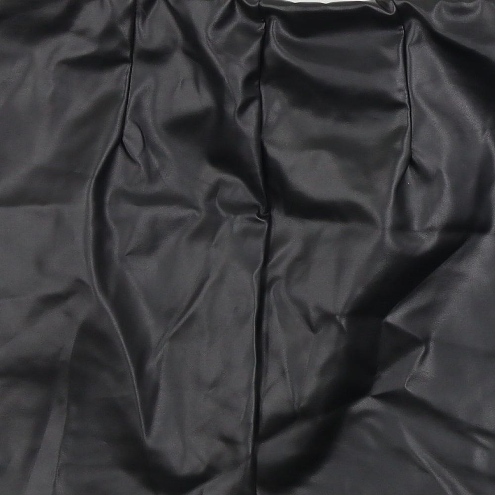 Brand and care label for ASOS women’s black bandage skirt, size UK 10