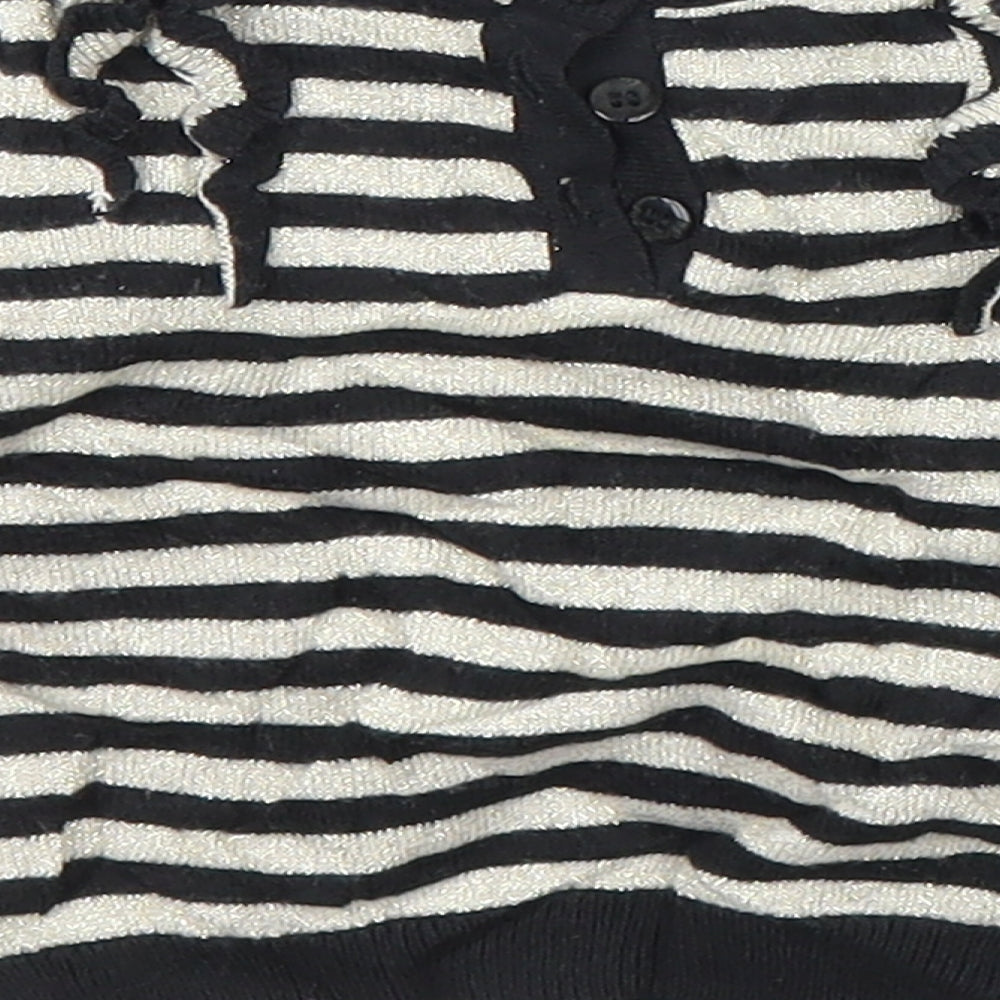 Brand and care label for Baby K girls’ black striped cardigan jumper, size 6-9, months