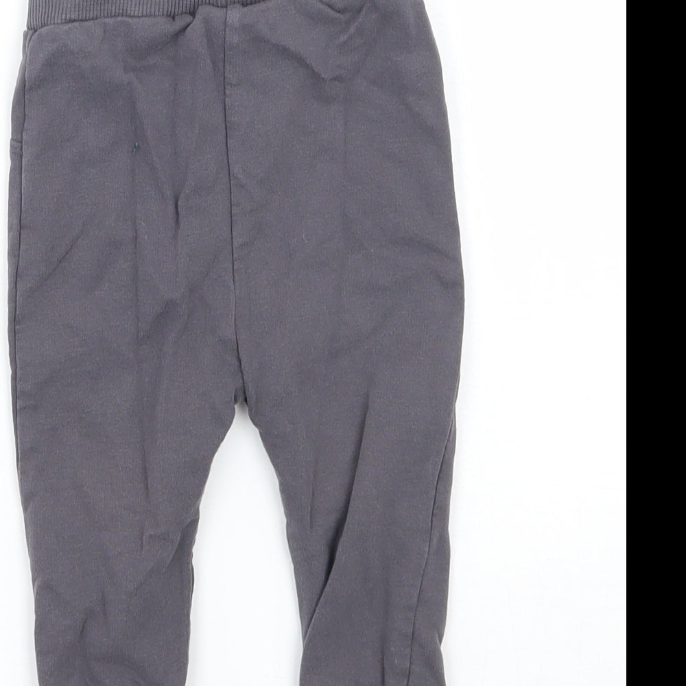 Brand and care label for Lc walkiki boys’ grey sweatpants, size 3-6, months - batman
