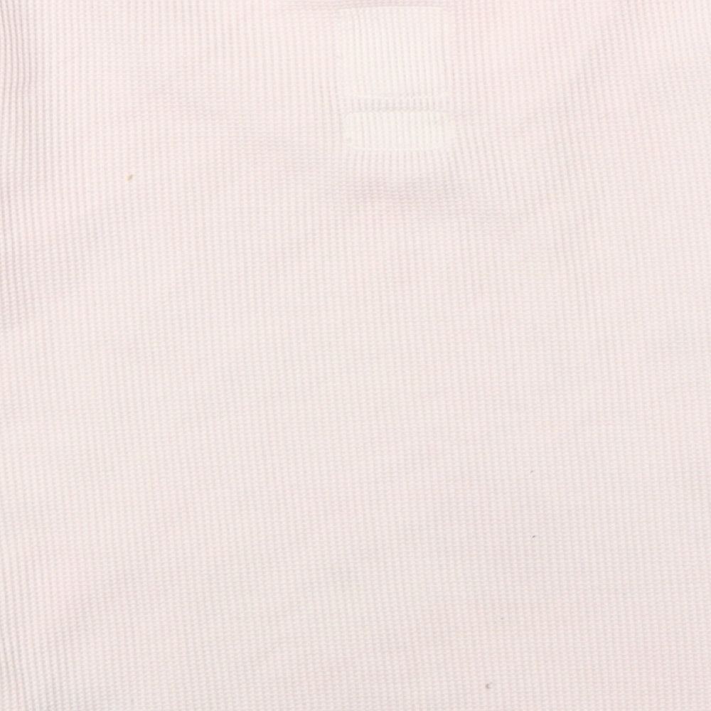 Brand and care label for Gap girls’ pink cropped t-shirt, size 10-11, years