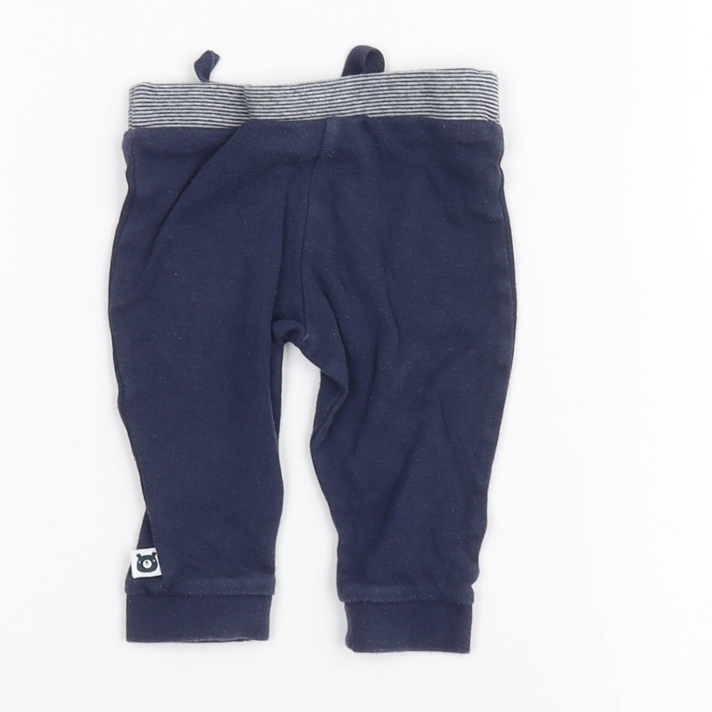 Brand and care label for F&F Baby Blue sweatpants, size 3-6, Months