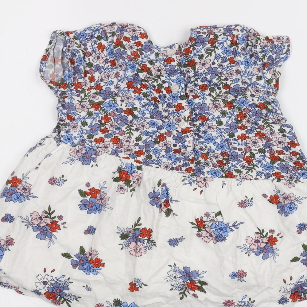 Brand and care label for Mini Club Baby White Floral A-Line, size 18-24, Months
