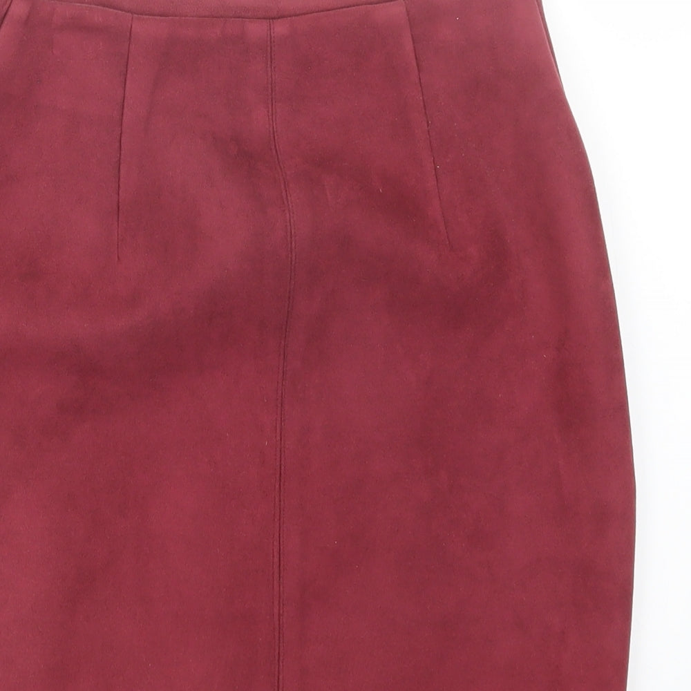 Brand and care label for Missguided women’s pink straight & pencil skirt, size UK 6