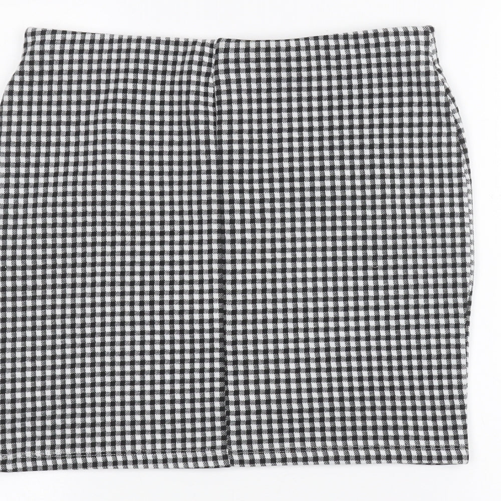 Brand and care label for Atmosphere women’s white mini skirt, size UK 10