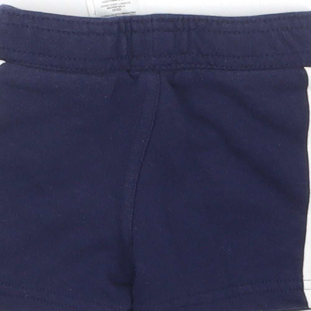 Brand and care label for Primark boys’ blue cropped trousers, size 3-6, months