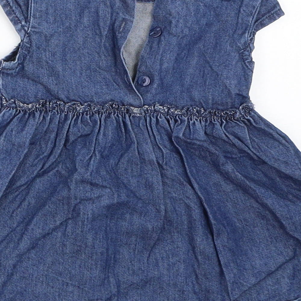 Brand and care label for Next girls’ blue denim fit & flare, size 3-6, months