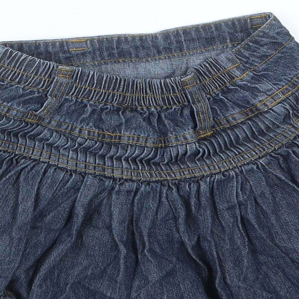 Brand and care label for Adams Kids girls’ blue denim a-line skirt, size 3, years
