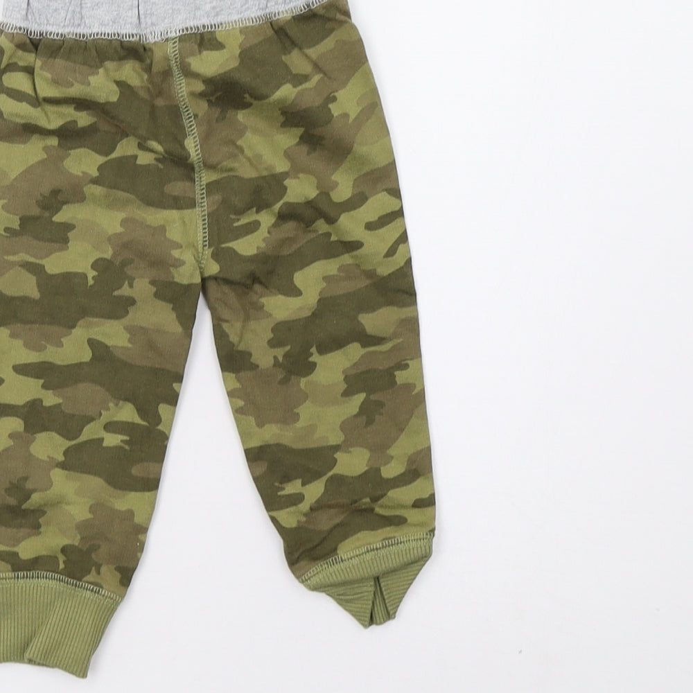 Brand and care label for carters Baby Green Camouflage sweatpants, size 6-9, Months