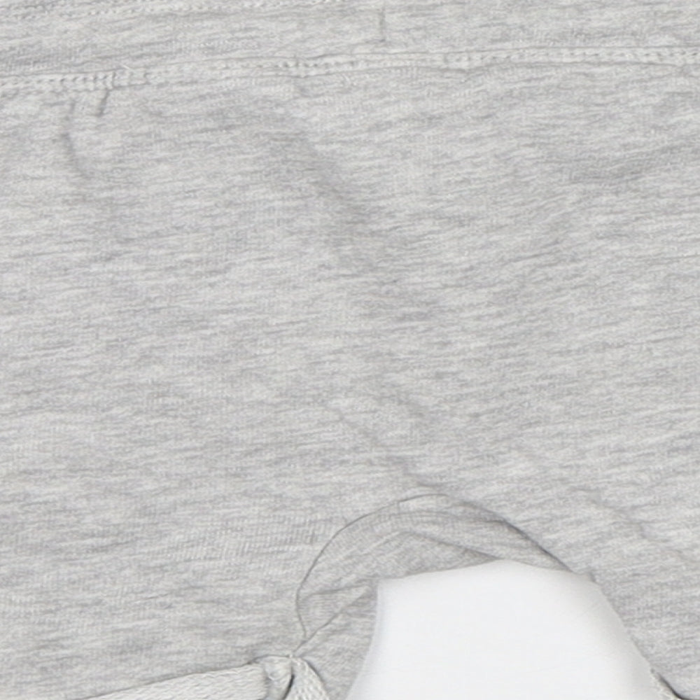 Brand and care label for H&M Baby Grey Jogger Trousers, size 12, Months