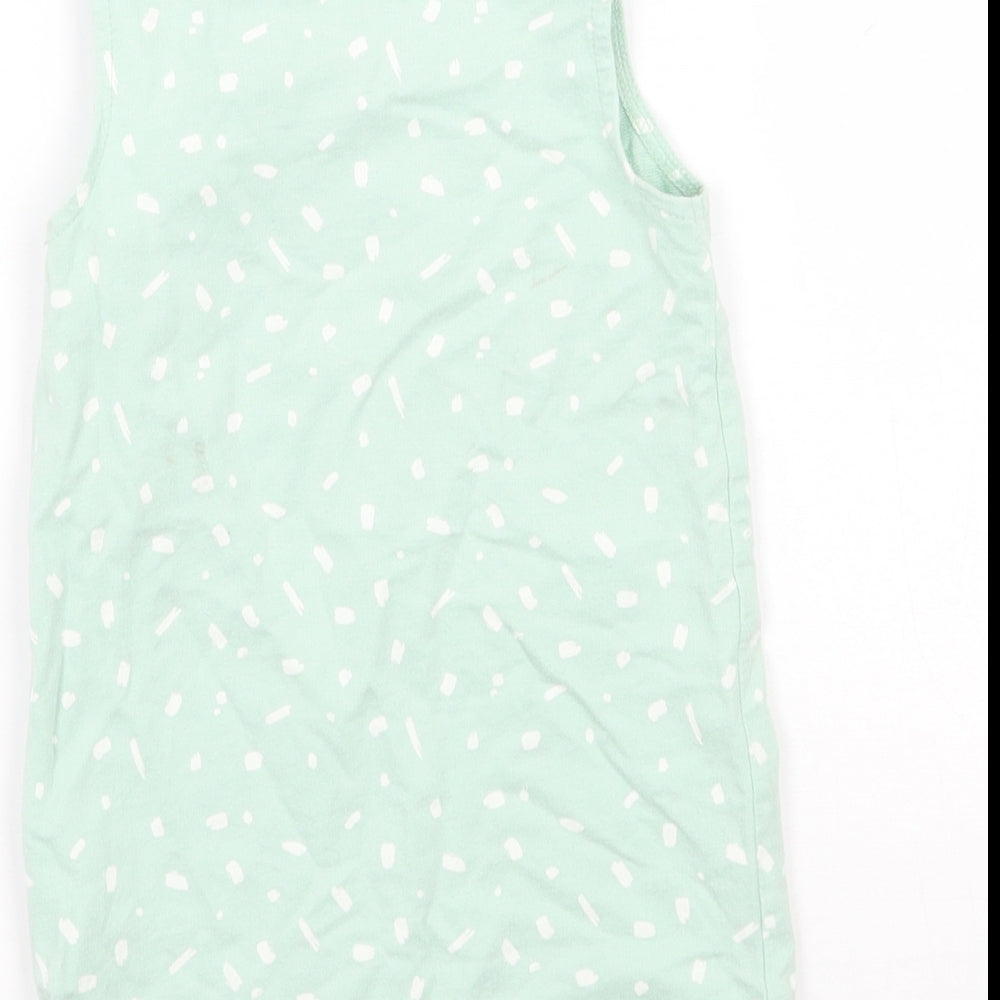 Brand and care label for Next girls’ green polka dot babygrow one-piece, size 3-6, months