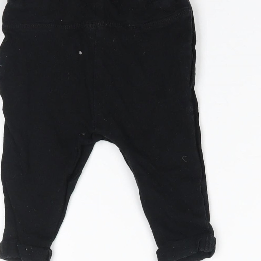 Brand and care label for Next Baby Black Jogger Trousers, size 3-6, Months