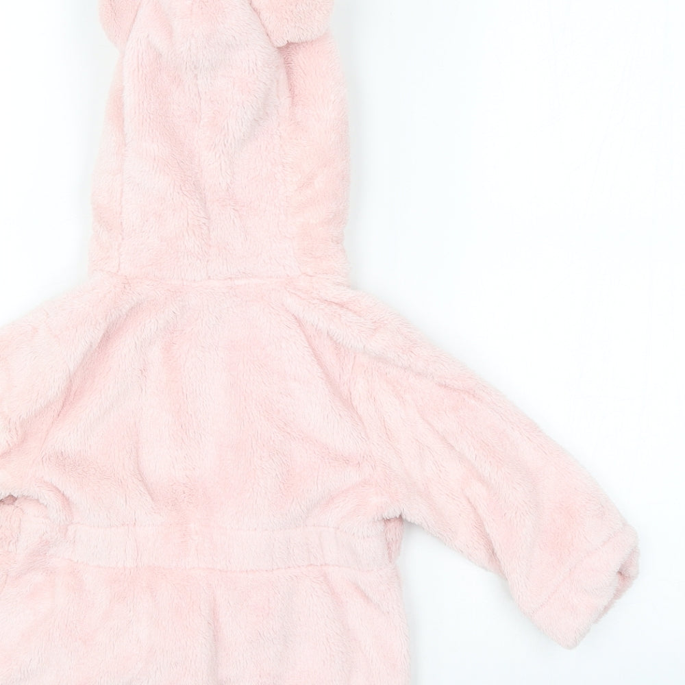 Brand and care label for Studio Baby girls’ pink gown, size 6-9, months
