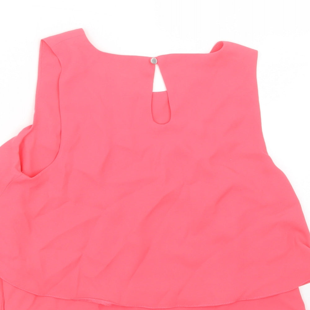 Brand and care label for Candy Couture girls’ pink basic blouse, size 10-11, years