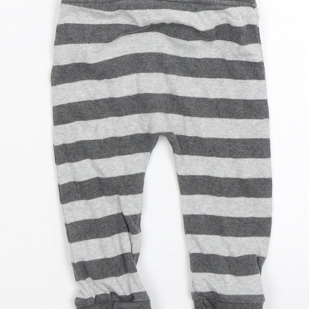 Brand and care label for George boys’ grey striped sweatpants, size 6-9, months