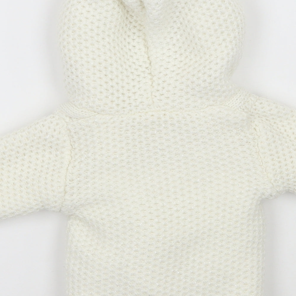 Brand and care label for Early Days girls’ white jacket coatigan, size 0-3, months