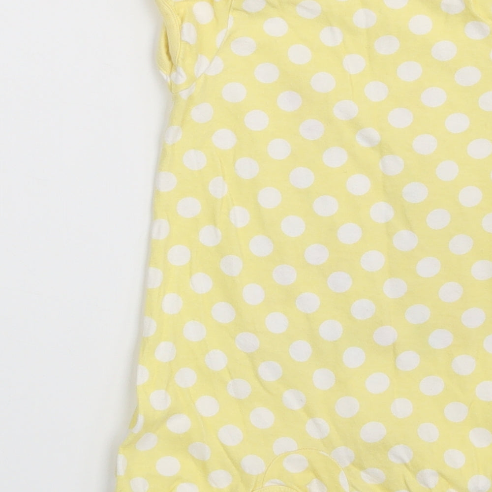 Brand and care label for Tu girls’ yellow polka dot pullover t-shirt, size 3-6, months - bee happy