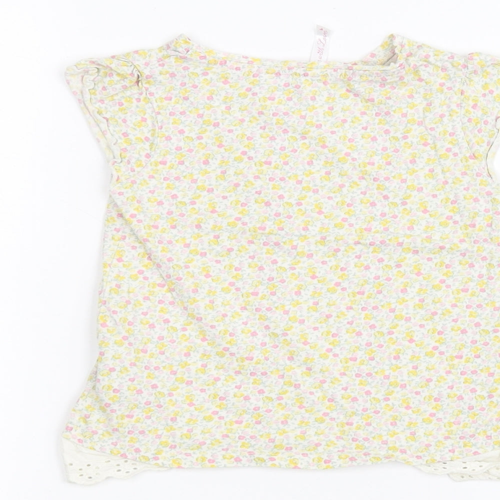 Brand and care label for Mothercare girls’ white floral basic t-shirt, size 3-4, years