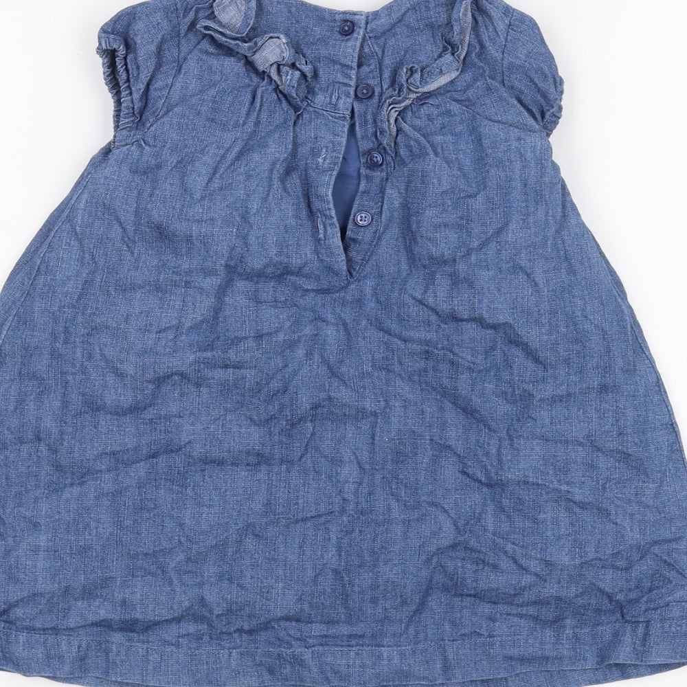 Brand and care label for Marks & Spencer Baby Blue A-Line, size 18-24, Months