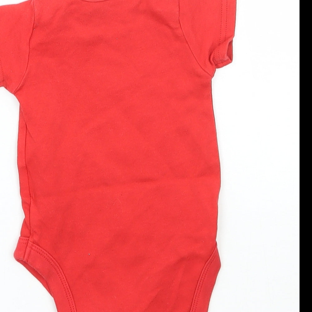 Brand and care label for Mothercare girls’ red babygrow one-piece, size 0-3, months