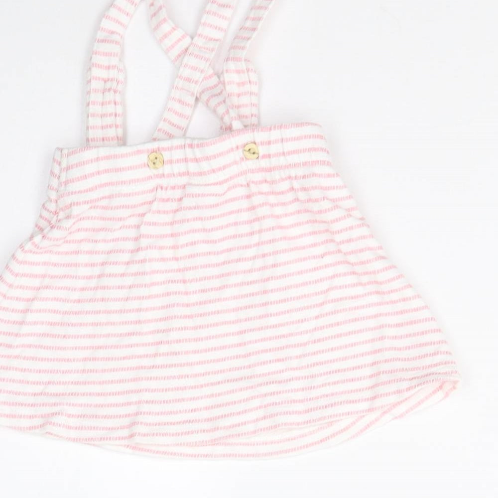 Brand and care label for H&M girls’ multicoloured striped pettiskirt skirt, size 6-9, months